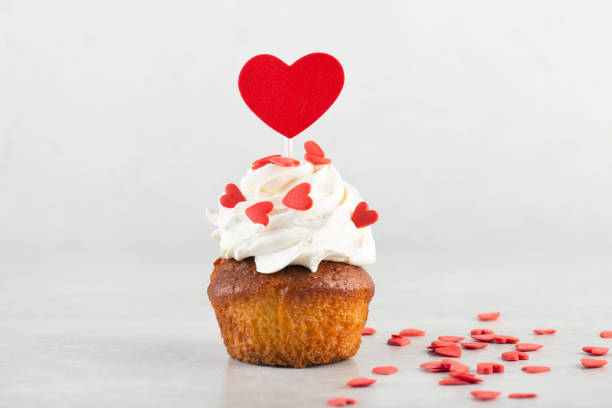 istock cupcake with red hearts on a gray table, Valentine's day, sweet gift 1341704895