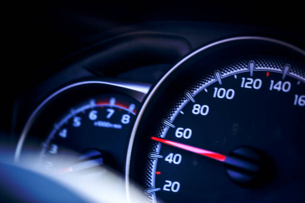 Detail view of car speed meter vehicle dashboard detail view with light kilometer photos stock pictures, royalty-free photos & images