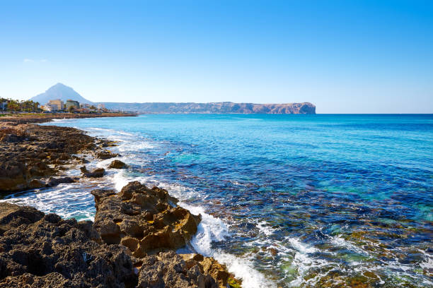 Javea Xabia Cala Blanca beach in Alicante Spain stock photo