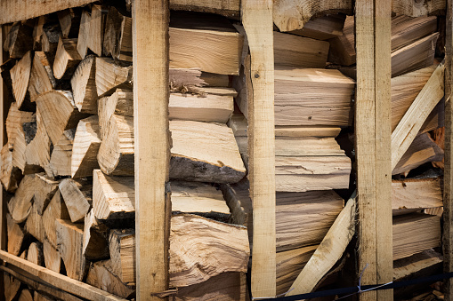 Firewood stacked on a pallet in the warehouse