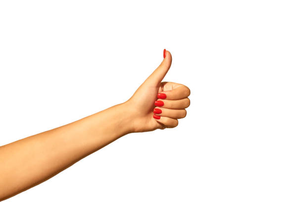 istock Girl's hand with thumb raised up isolated on white background 1341712368