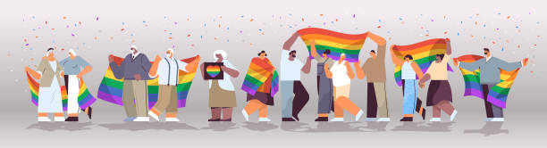mix race senior people group holding lgbt rainbow flag gay lesbian love parade pride festival transgender love concept - mature adult stock illustrations