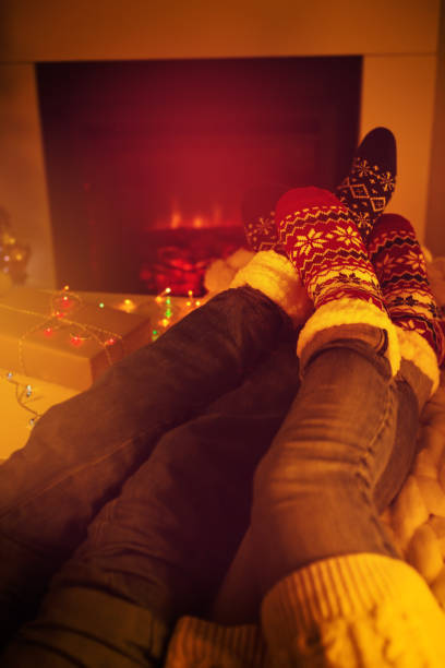 istock woolen socks near fireplace 1341714439