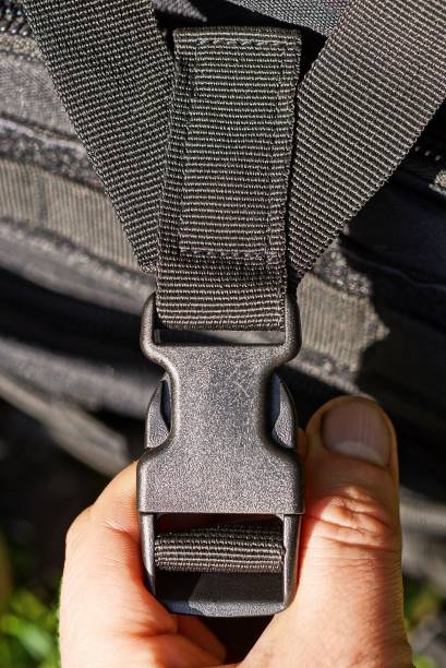 istock hand hold a one closed black plastic carabiner on a harness 1341715719