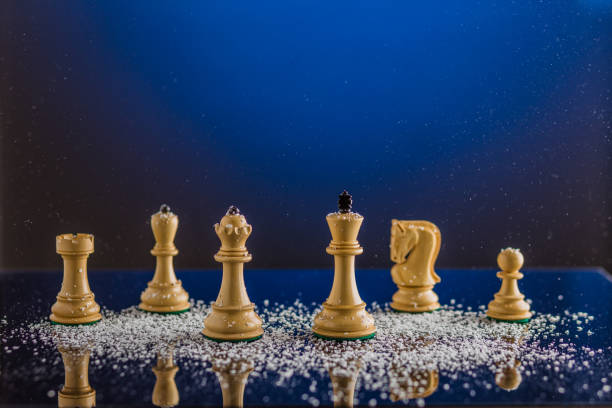 istock chessboard and chess pieces in a christmas or newyear postcard. strategy, intelligence board game 1341717493