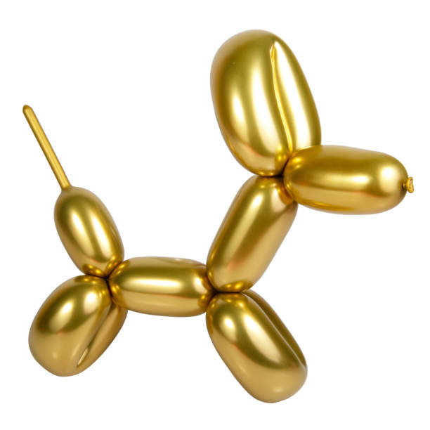 istock Gold bright balloon dog isolated on the white background 1341717695