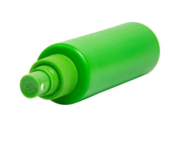 istock Green spray bottle isolated on the white background 1341718402