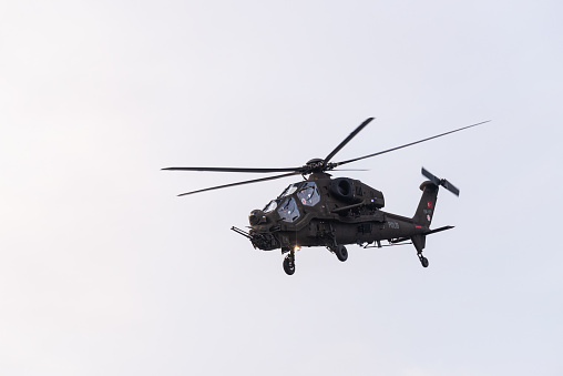 Izmir, Turkey - September 9, 2021: Police Atak helicopter demonstrating in the sky on the liberty day of Izmir.