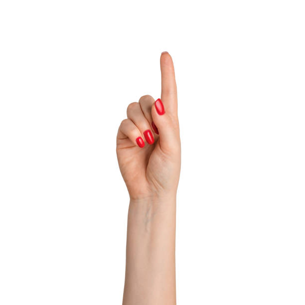 Female hand with red nail polish presses, on a white background, isolate stock photo