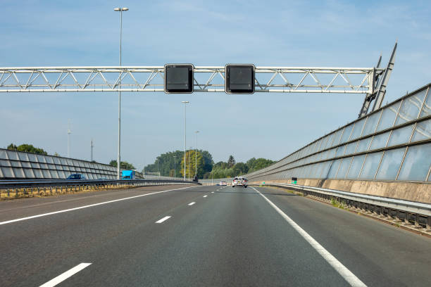 istock Traffic information signs over Dutch highway A15 1341723490