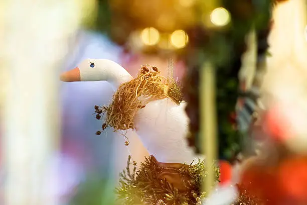 Background bird(goose) Image of amazing fairy handmade gifts in Christmas’eve market in Saltsburg-Hellbrunn, Austria.