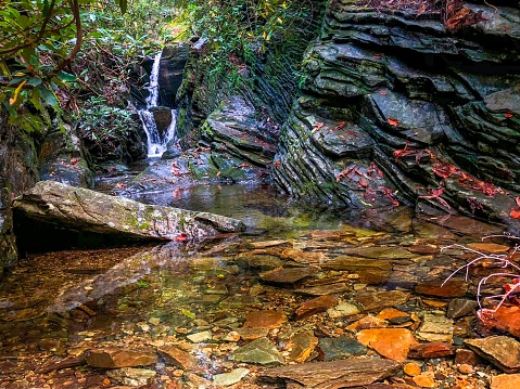 Waterfalls, water stream trickling down rocks North Carolina in the fall￼