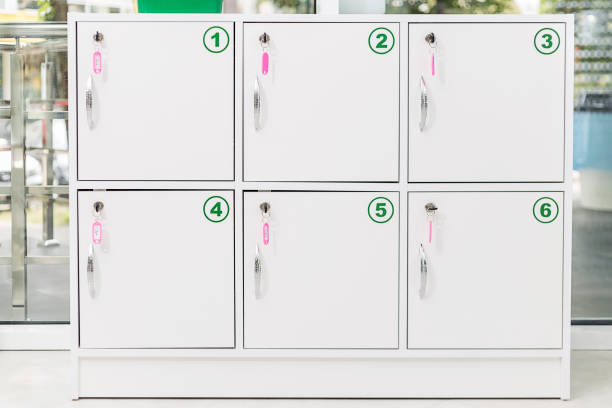 istock White lockers with keys in locks and with numbering numbers 1341726372