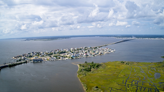 New Jersey shore beach, aerial view looking south toward island resort town along Rt. 37.
