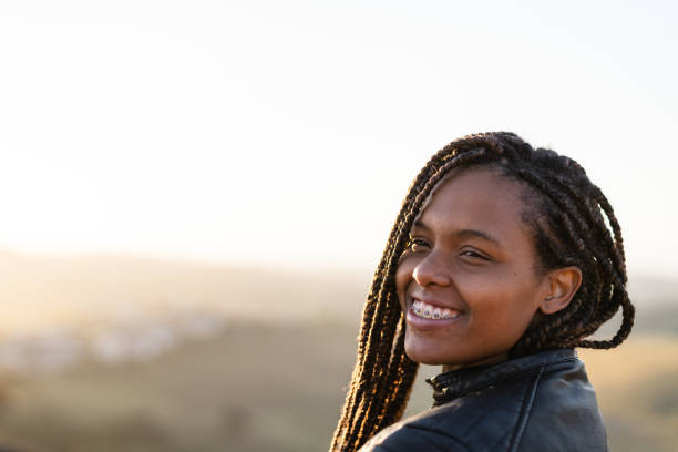 istock Young woman with braids outdoors in winter 1341736137