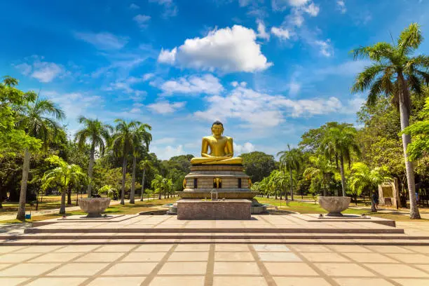 Giant seated Buddha in the Viharamahadevi park in Colombo, Sri Lanka