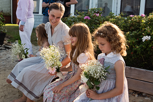 Family relaxing on the grass.  Check out thesealong with other