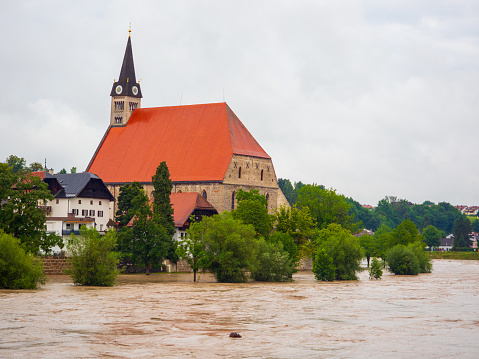 Beginning flood at river Salzach in July 2021 at the city of Laufen in July 2021