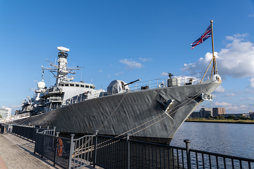 HMS Argyll moored at Royal Victoria Dock next to ExCel in London on a beautiful sunny autumn day.