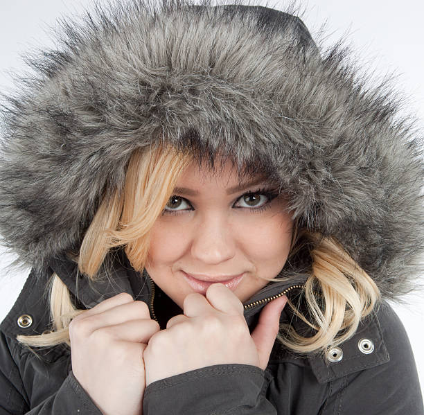 istock Beautiful Blonde woman in parka 134175401
