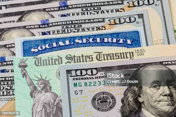 Social Security Card Treasury Check And 100 Dollar Bills Concept Of Social Security Benefits Payment Retirement And Federal Government Benefits Stock Photo - Download Image Now