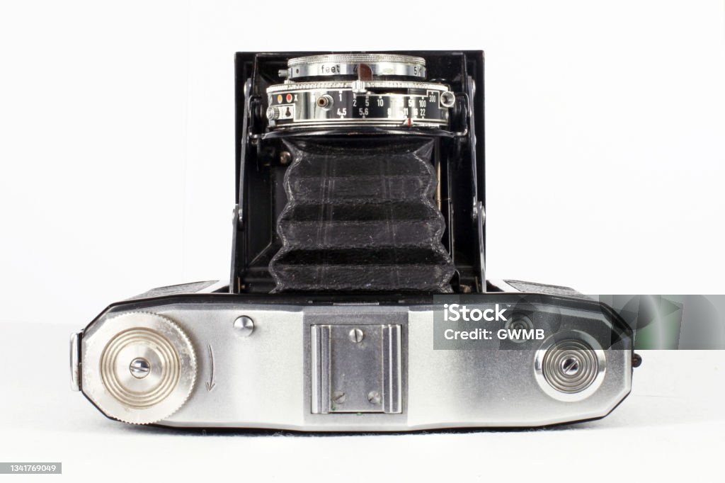 A German vintage Zeiss Ikon Nettar bellows type camera German made vintage Zeiss Ikon Nettar bellows or folding type medium format camera with the lens extended. The camera uses 120 mm roll film. 1954 Stock Photo