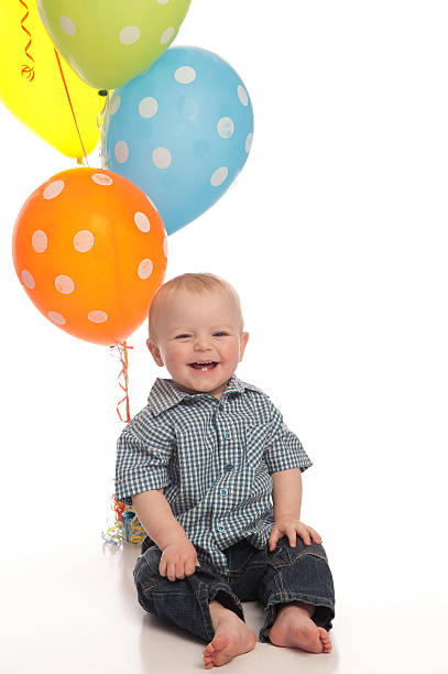 Little boy with balloons stock photo