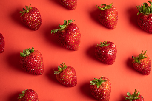 many strawberry making a fruit pattern