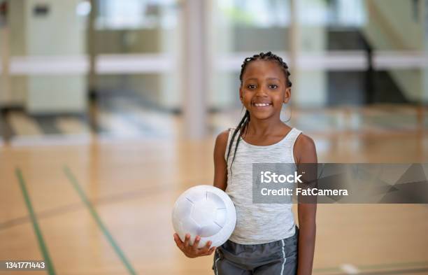 Elementary Student During Gym Class Stock Photo - Download Image Now - Volleyball - Sport, Child, Girls