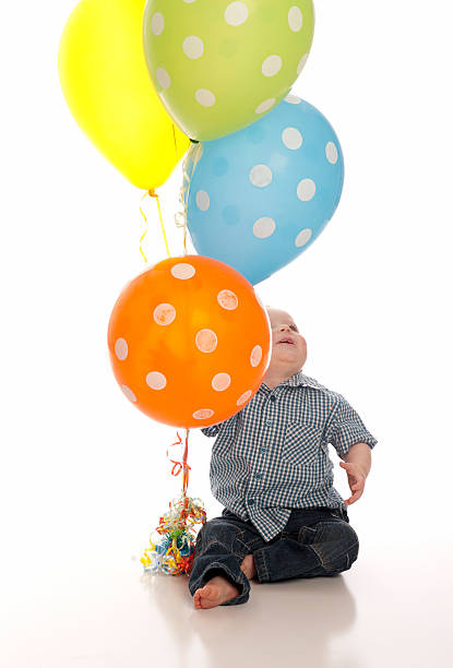 Little boy with balloons stock photo