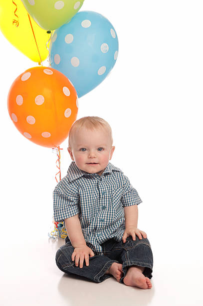 Little boy with balloons stock photo