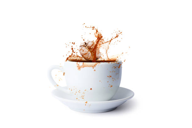 istock Pouring of hot coffee in cup and falling beans isolated on white background 1341781342