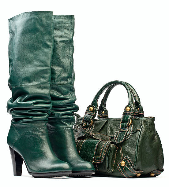 istock Green female high-heeled boots and leather bag 134178140