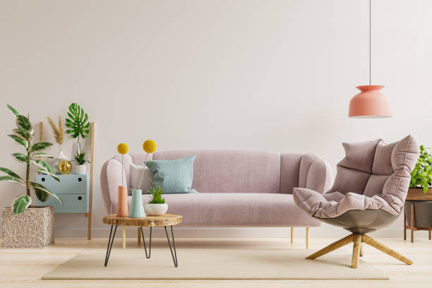 istock On an empty light white wall background, there is a living room with a sofa and an armchair. 1341782416