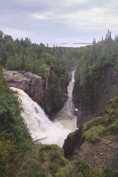 Waterfalls into stream stock photo