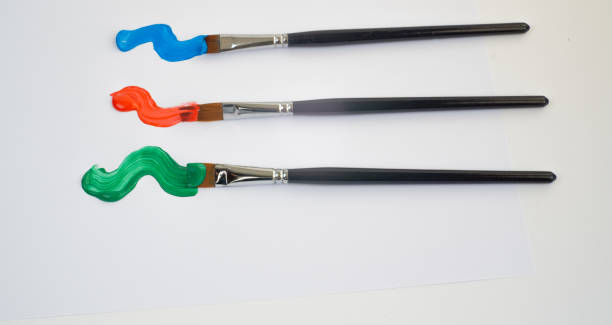 istock artists brushes with colored oil paint 1341786034