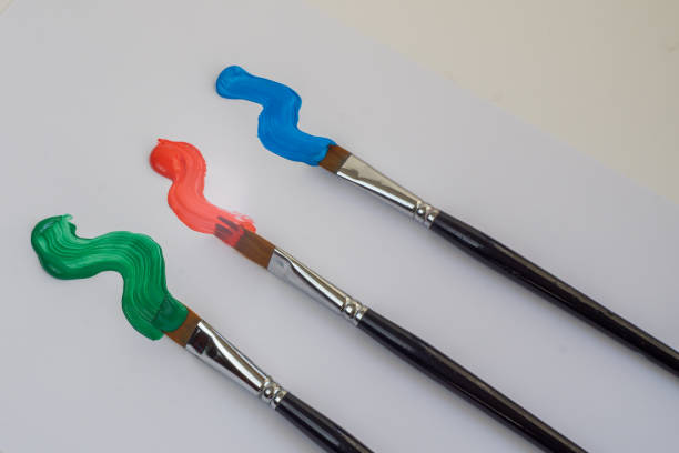 istock artists brushes with colored oil paint 1341786036
