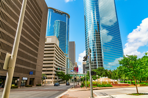 View of modern city skyscrapers from below located in the center of downtown Houston, Texas.