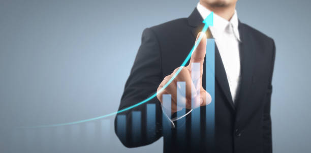 istock Businessman plan graph growth and increase of chart positive indicators 1341787581
