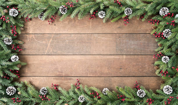 istock Christmas Garland Frame on Wood 1341787603