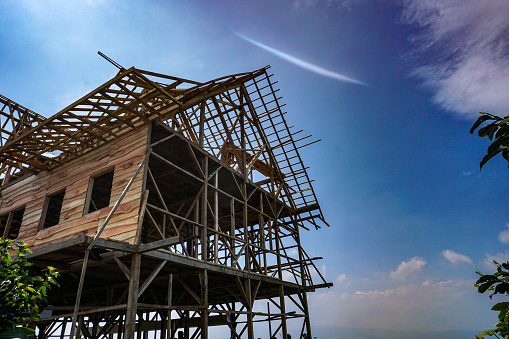 Bandung, Indonesian - September 5, 2021 : In progress construction of a wooden house