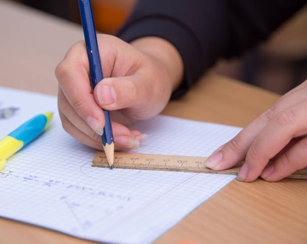 istock The pupil in a pencil in a circle marks the center. 1341789042