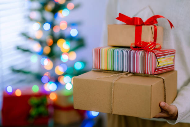 istock Asian woman making Christmas present. 1341794701
