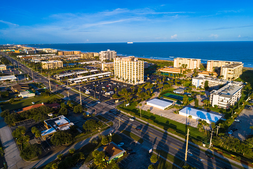 Late afternoon aerial view of Cocoa Beach in Central Florida just east of Orlando, with the Atlantic Ocean in the background.