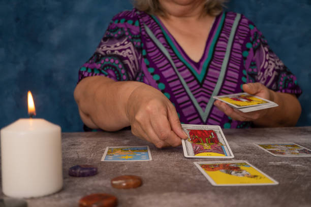 istock woman casting tarot cards 1341799290