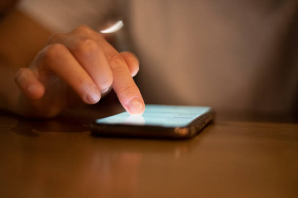 istock blurred choosing and ordering food using a smartphone during a pandemic, horizontal 1341801690