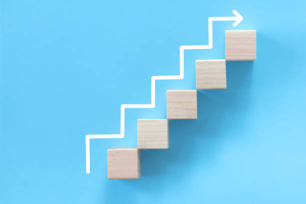 istock Zigzag arrow is drawn to indicate going up the stairs. 1341803817
