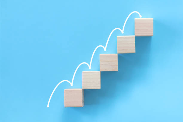istock Jump on the stairs made of stacking blocks. 1341803827