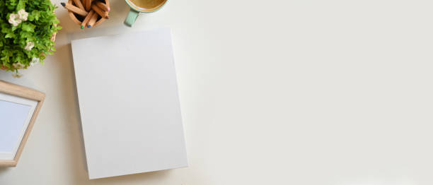 istock Blank white book cover and copy space for montage on white background 1341804468