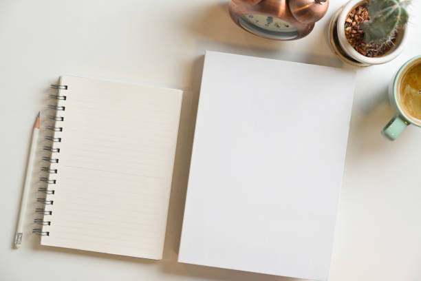 istock Blank book cover and notepads for text display on white background 1341804478